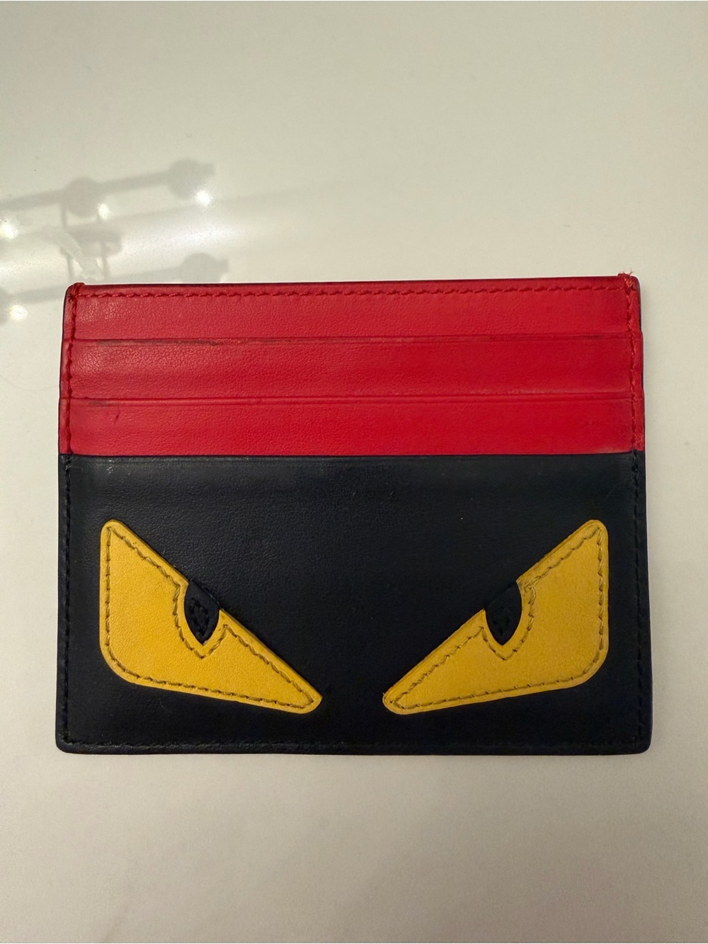 Fendi Red and Black Leather Card Holder with Yellow Eye Motif